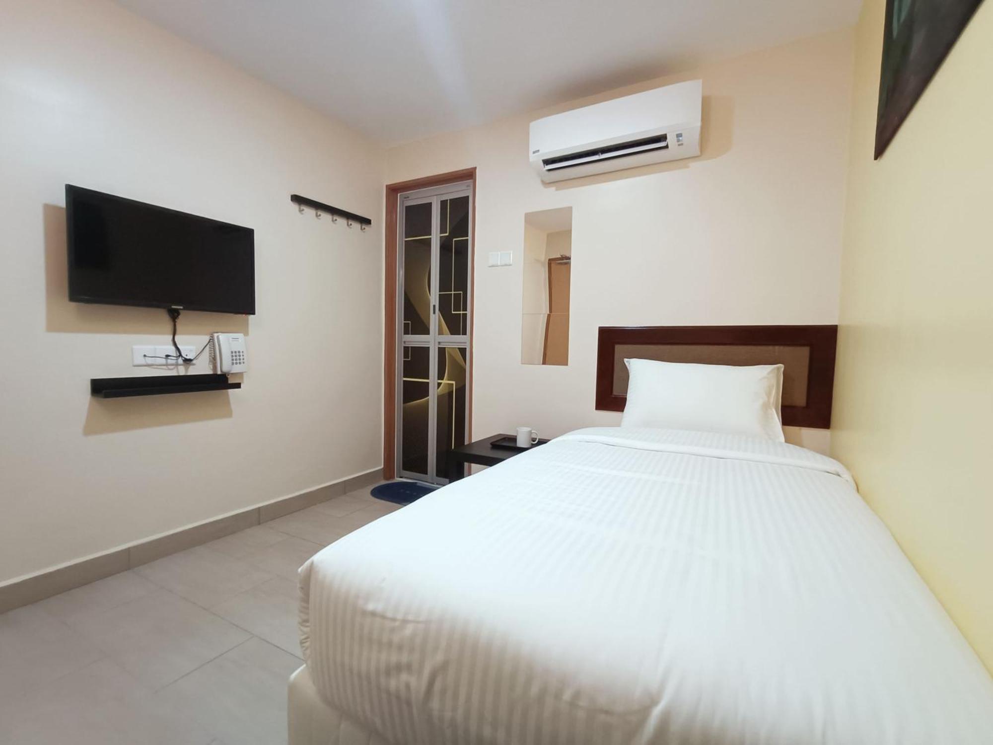 Capital O 90897 Island City Hotel George Town Ngoại thất bức ảnh