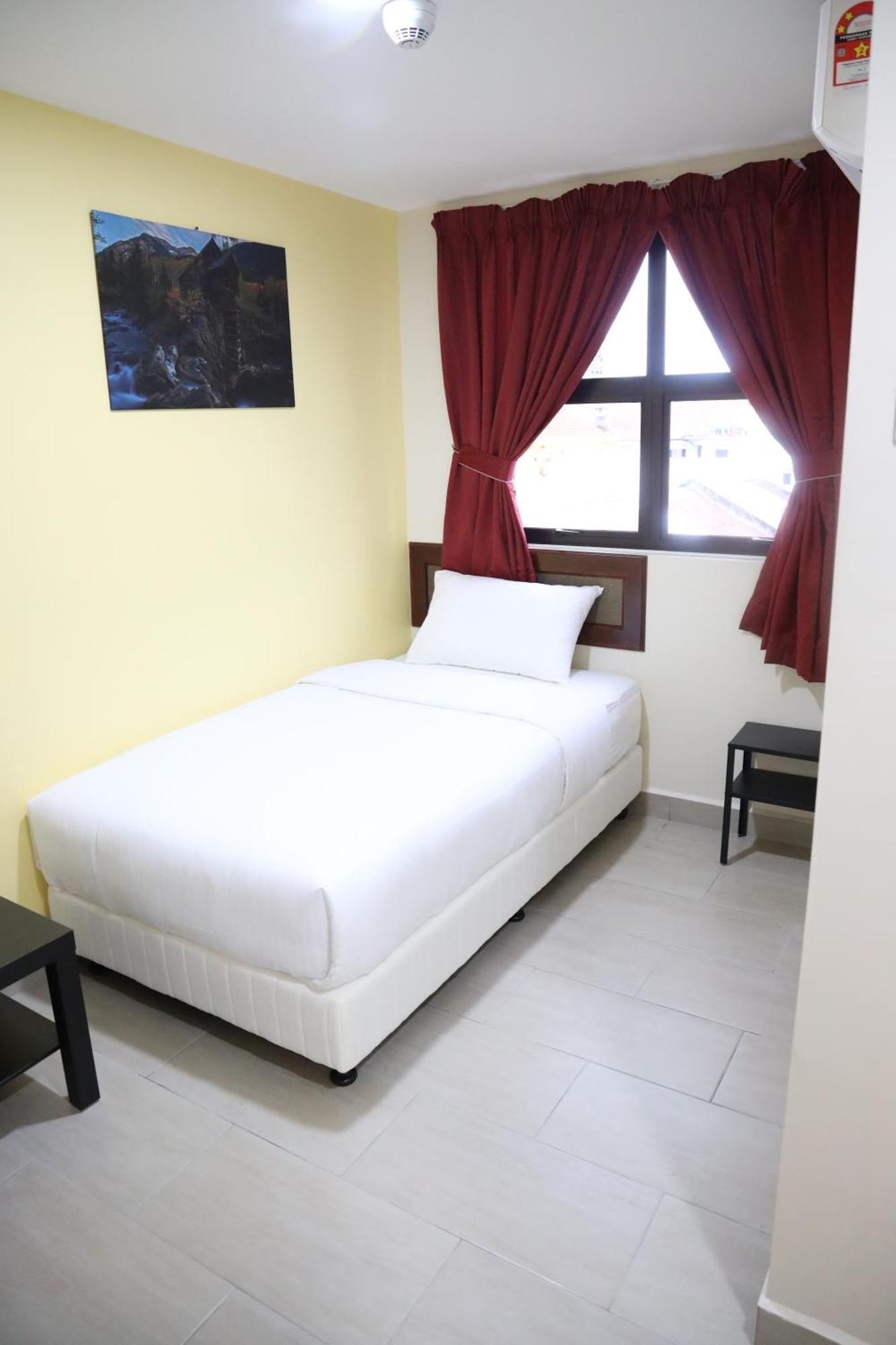 Capital O 90897 Island City Hotel George Town Ngoại thất bức ảnh